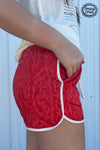 RAISED ROUND HERE SHORTS - RED