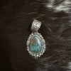 NAVAJO SILVER PENDANT WITH KINGMAN TURQUOISE